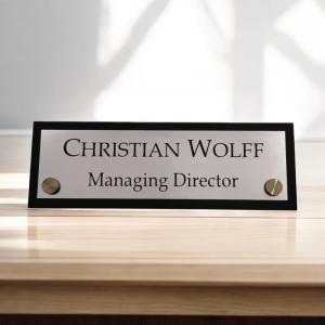 Gugan's Acrylic Desk Name Plate - Personalised Desk Name Plate, Custom Desk Sign, Office Plaque, Executive Office Sign (12 x 4 Inches) with 2 nos Studd (Black and Silver)